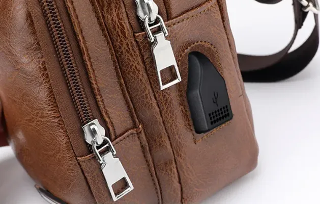 USB Portable Charging Chest/Messenger Bag with Adjustable Shoulder Strap and Soft Wear-resistant PU Leather and Front Pockets